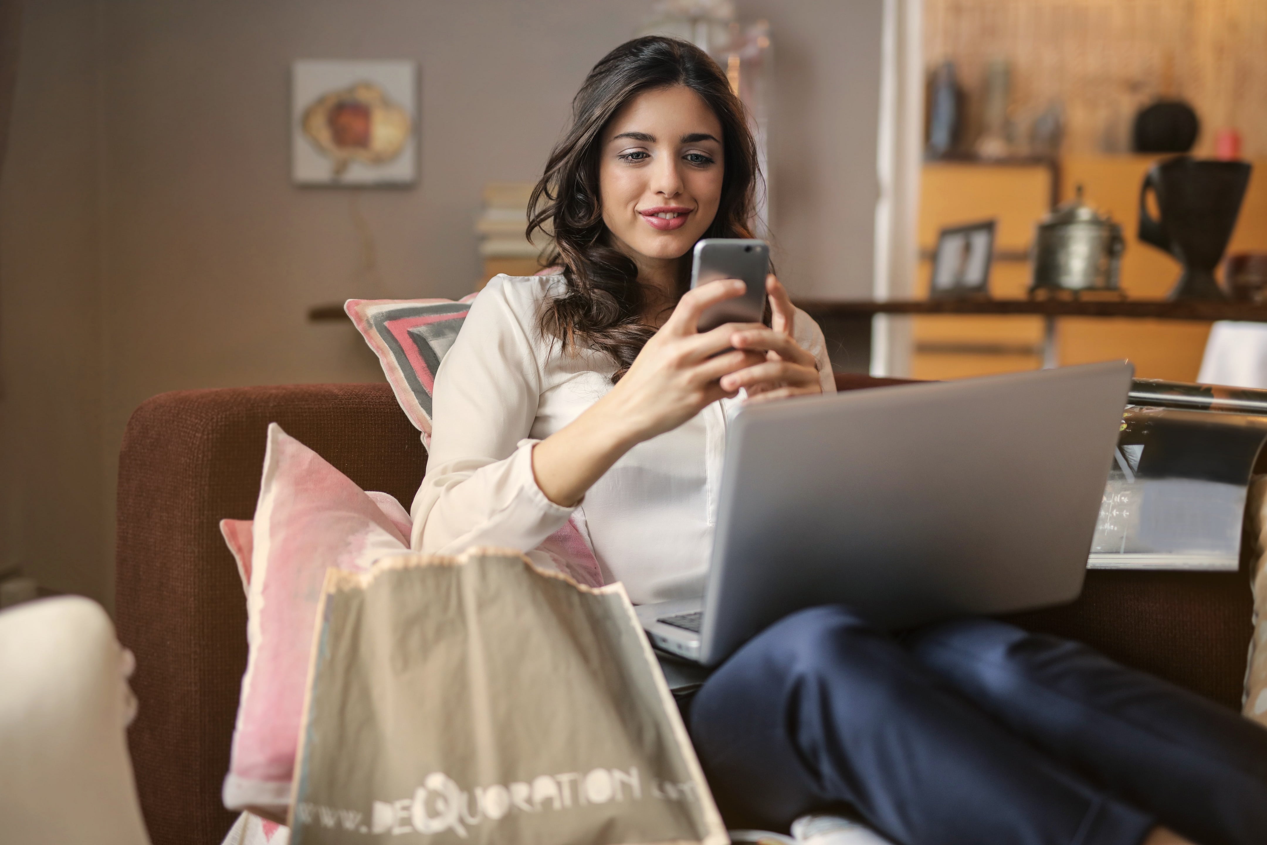 Woman Shopping from Mobile and Laptop